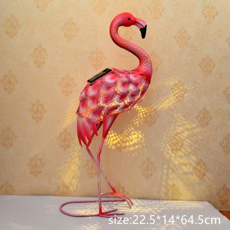 Flamant rose lumineux solaire